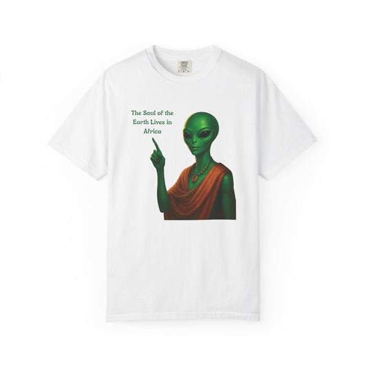 White Mashafrica T shirt featuring a green alien in an orange robe pointing with text The Soul of the Earth Lives in africa