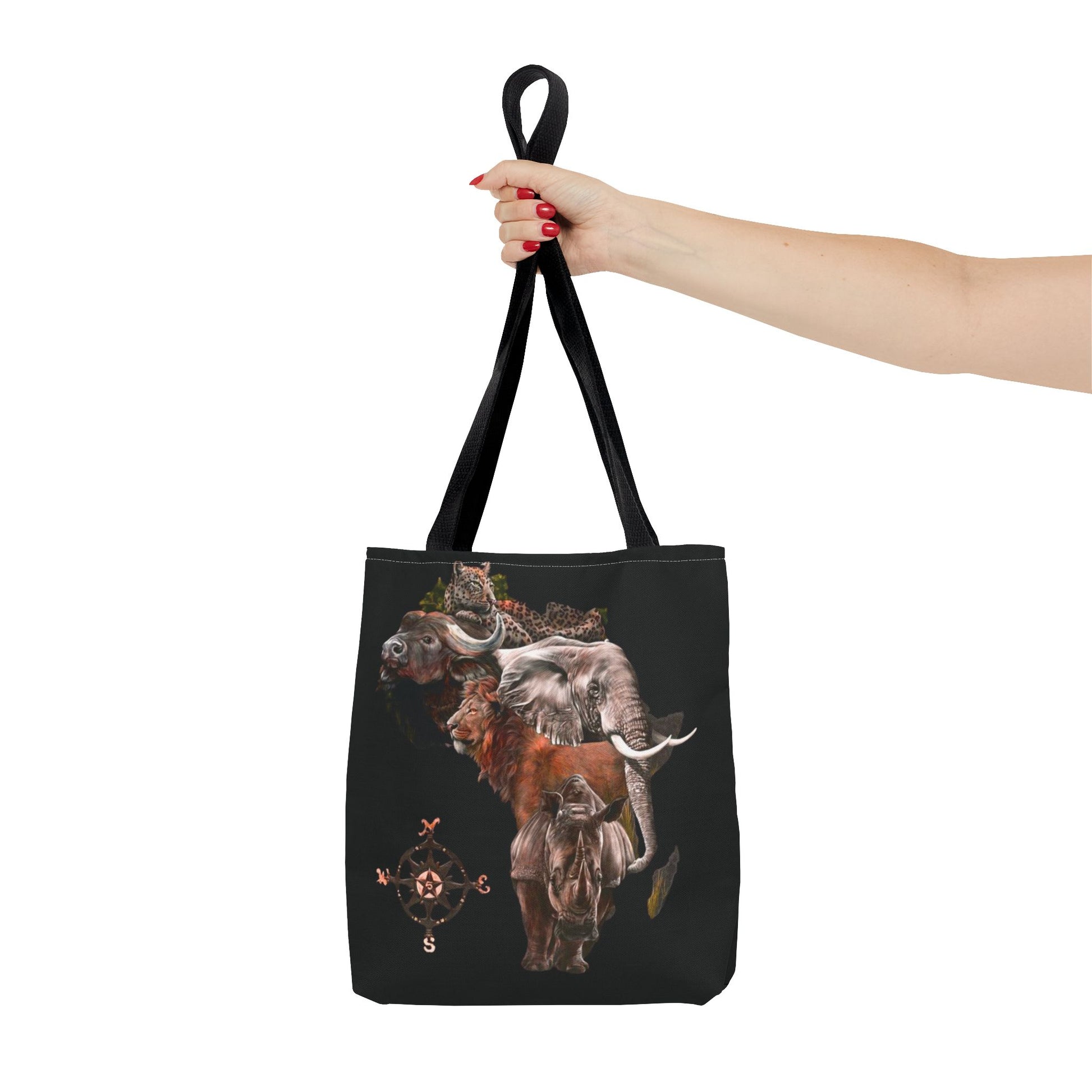 Black Mashafrica tote bag with africa wildlife collage forming continent shape featuring elephant rhino buffalo and compass