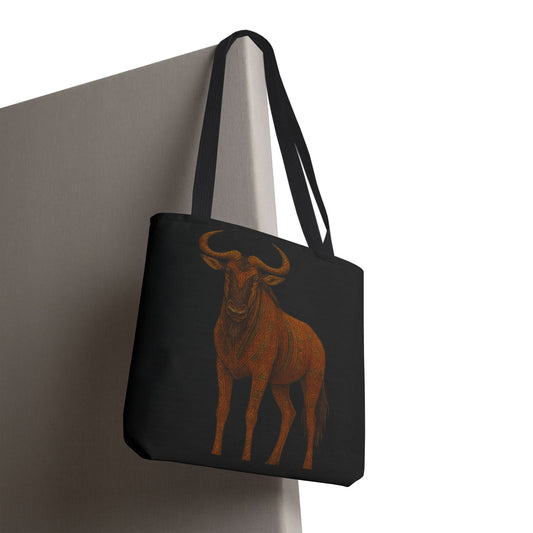 Mashafrica black tote bag with rust orange wildebeest illustration on canvas and long shoulder straps