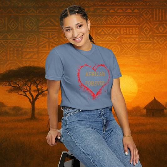 Mashafrica blue casual cotton t shirt with red heart and african forever print worn by smiling model in sunset scene