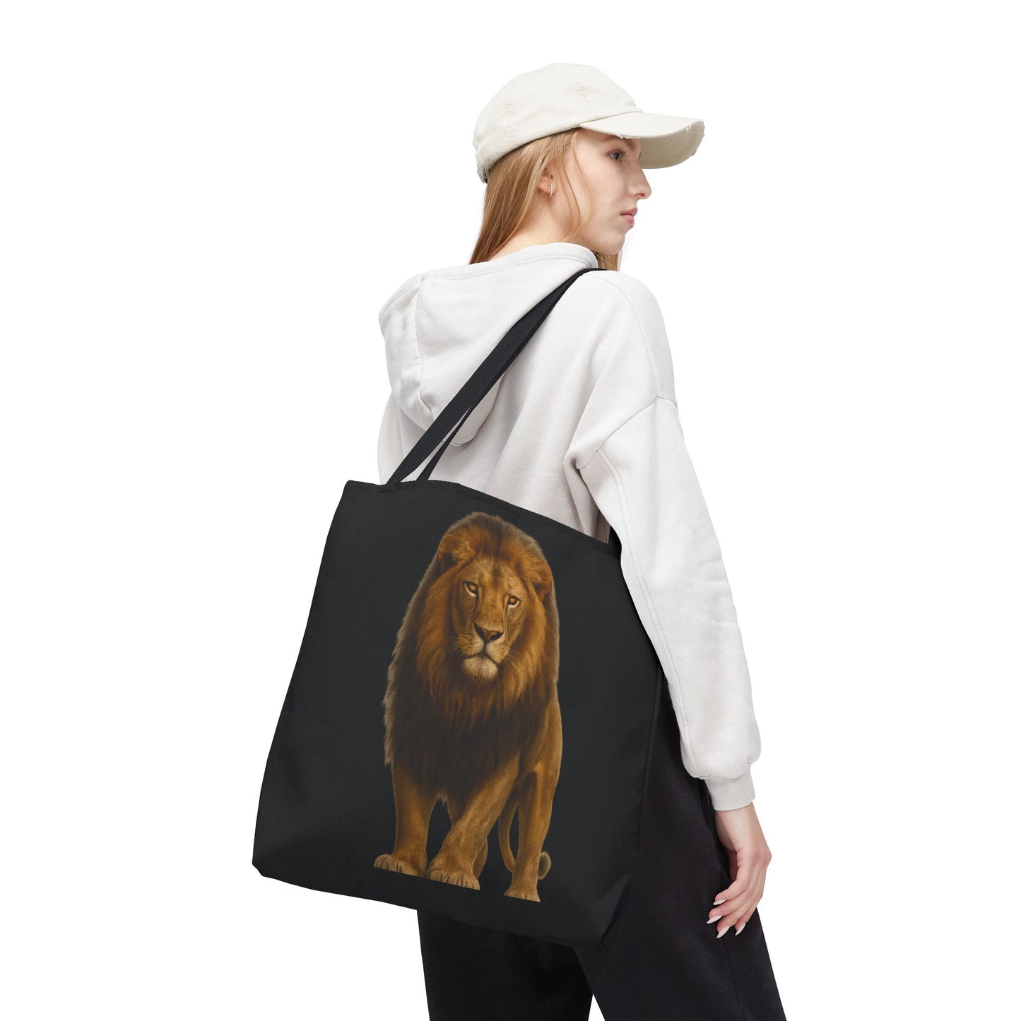 Mashafrica black canvas tote bag with realistic lion print shown on model shoulder ideal for errands