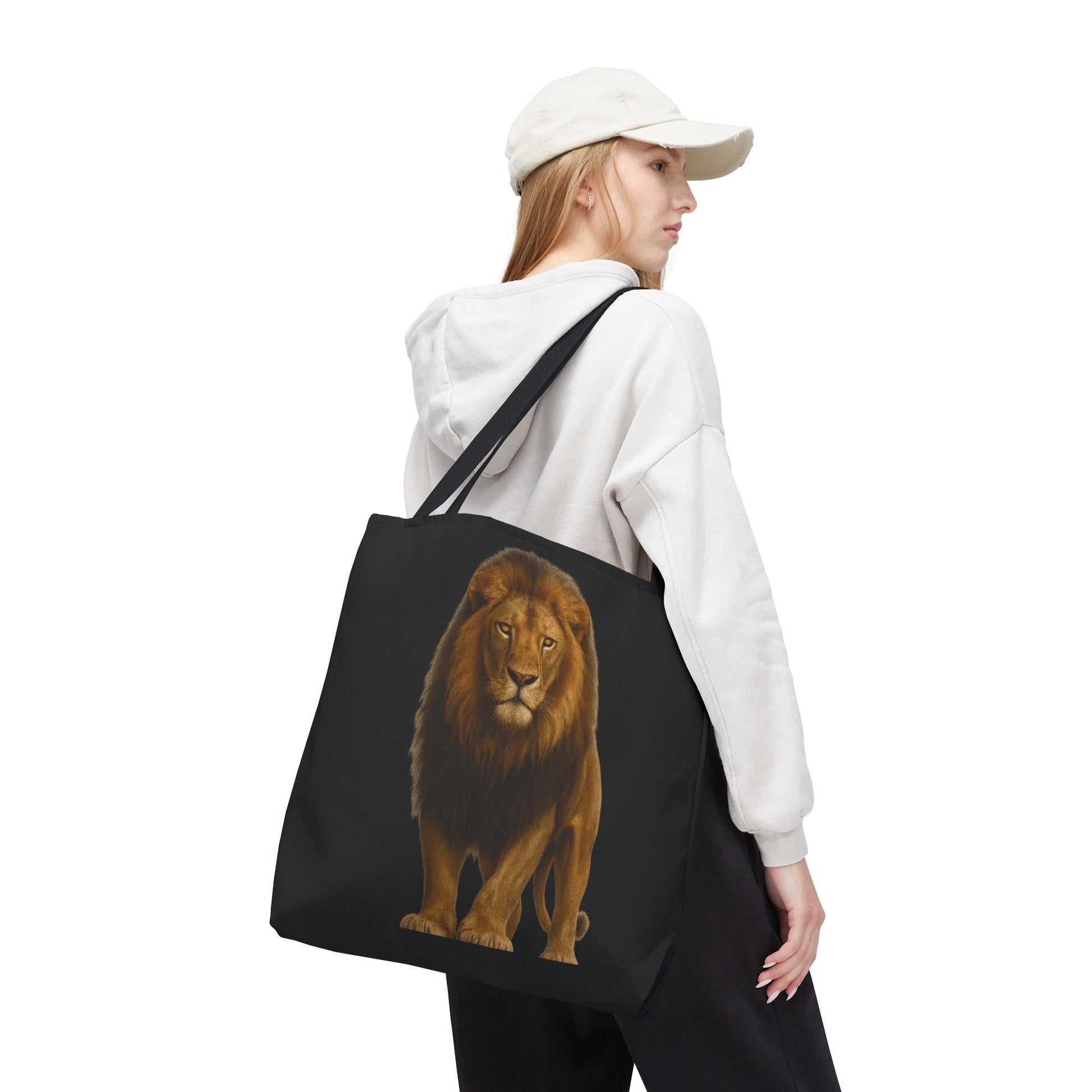 Mashafrica black canvas tote bag with realistic lion print shown on model shoulder ideal for errands