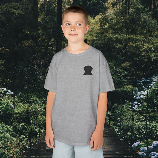 Mashafrica kids grey t shirt with small cute dog silhouette on chest modeled by boy in outdoor setting
