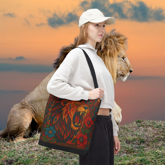 Woman in white cap carrying Mashafrica tote bag with colorful roaring lion and floral print at sunset