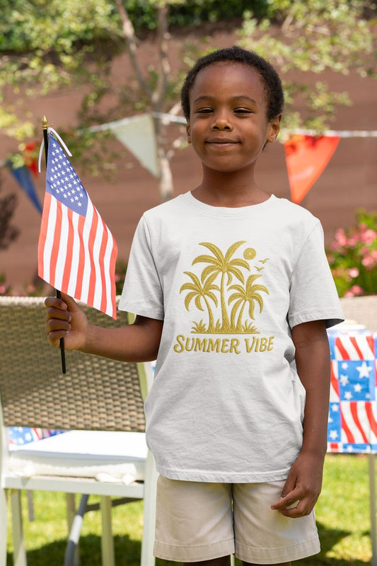 Mashafrica kids white Summer Vibe t shirt with palm trees child holding American flag at backyard party