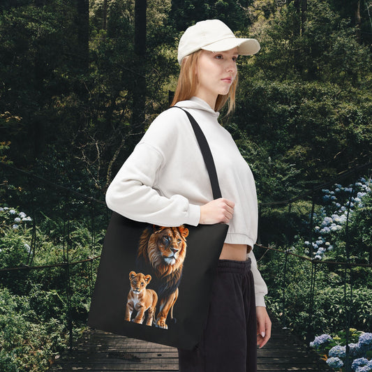 Mashafrica black tote bag with realistic lion and cub print carried by woman in casual outfit